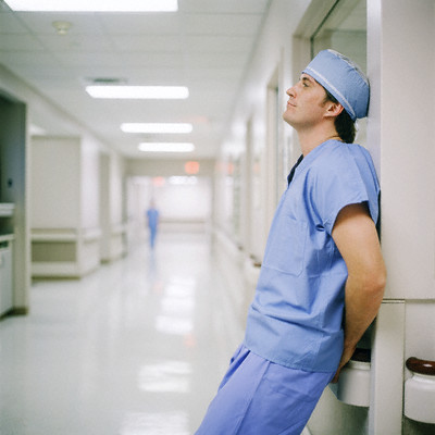 Tired Hospital Worker --- Image by © 68/Ben Edwards/Ocean/Corbis