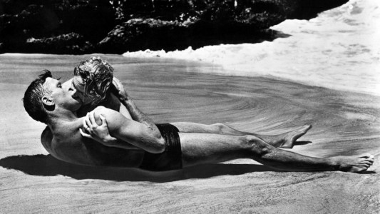 Burt Lancaster and Deborah Kerr, shown here in a famous scene still from the 1953 Academy Award®-winning film "From Here to Eternity," both received Oscar® nominations for their roles in the film. Lancaster was nominated in the Best Actor category for his portrayal of Sgt. Milton Warden while Kerr received a Best Actress nomination for her role of "Karen Holmes." The film received 13 nominations in total and won eight Oscars® including Best Picture. Restored by Nick & jane for Dr. Macro's High Quality Movie Scans Website: http:www.doctormacro.com. Enjoy!