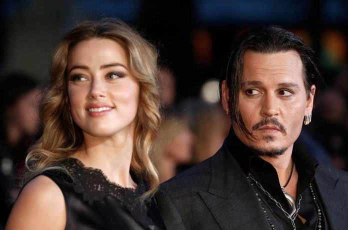 alx_entretenimento-johnny-depp-amber-heard-bfi-film-festival-londres-20151011-03_original Ficar neutro em casos de agressão contra a mulher é defender o agressor