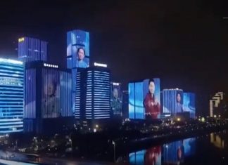 China projeta em seus edifícios os rostos de médicos que atuam no combate ao coronavírus