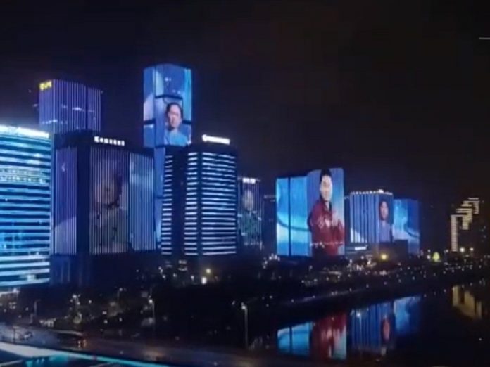 China projeta em seus edifícios os rostos de médicos que atuam no combate ao coronavírus