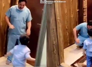 Enfermeiro chora por não poder abraçar o filho durante a pandemia de COVID-19