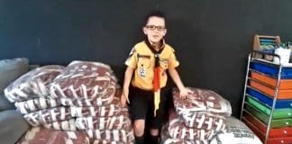 Com apenas 8 anos, escoteiro coleta 500 kg de alimento para doar aos afetados pelo coronavírus