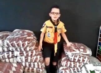 Com apenas 8 anos, escoteiro coleta 500 kg de alimento para doar aos afetados pelo coronavírus