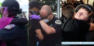 Policiais e manifestantes se abraçam durante manifestações contra violência policial nos Estados Unidos