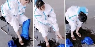 Médica na linha de frente contra Covid-19 derrama litros de suor ao tirar seu uniforme Médica na linha de frente contra Covid-19 derrama litros de suor ao tirar seu uniforme