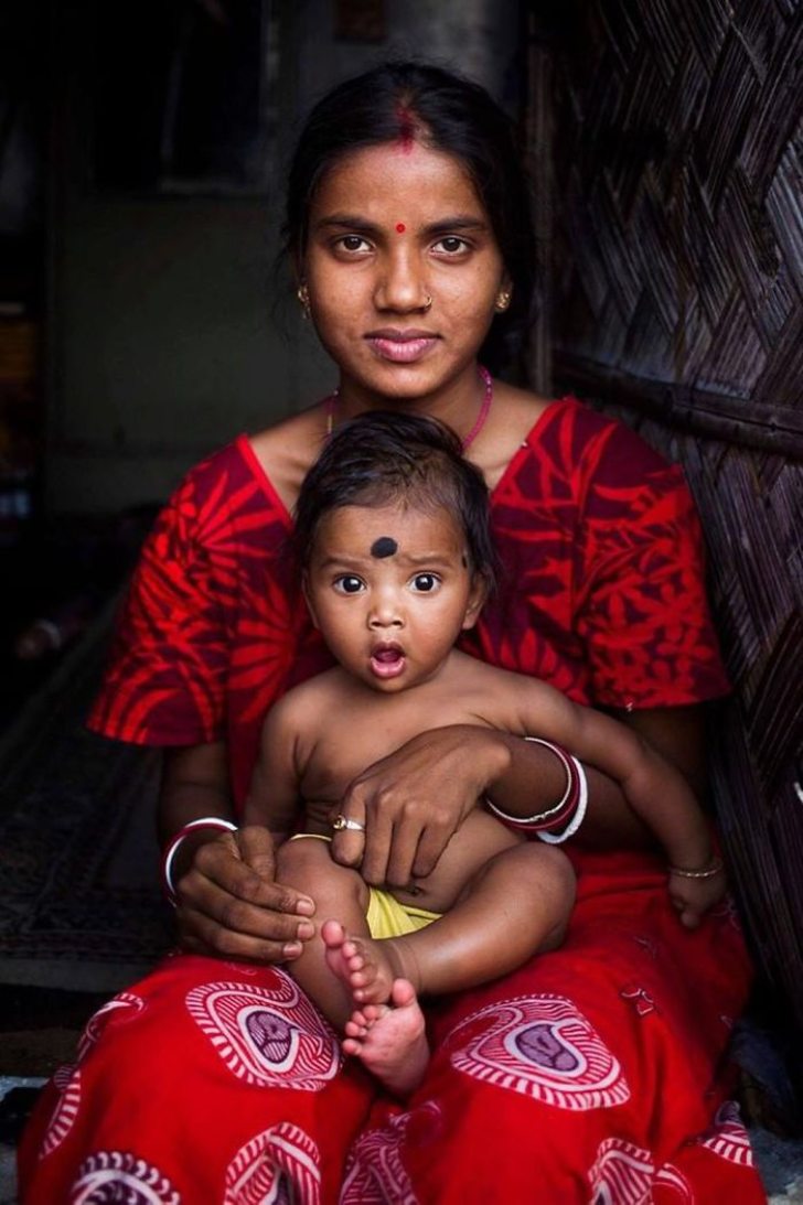 contioutra.com - 26 fotografias que captam a essência da maternidade em diferentes países. Um amor universal!