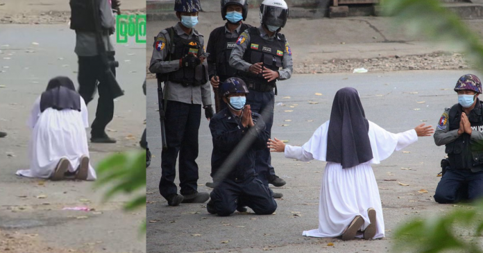 Freira se ajoelha diante de soldados armados para defender crianças na Birmânia