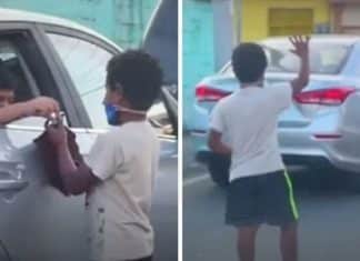 Criança doa brinquedo a menino que trabalha em semáforo e eles brincam juntos