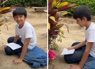 Menino faz tarefas escolares diante do túmulo da mãe e mostra suas notas: “Ela se orgulha de mim”