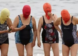 Onda de calor na China faz crescer a popularidade dos ‘facekinis’